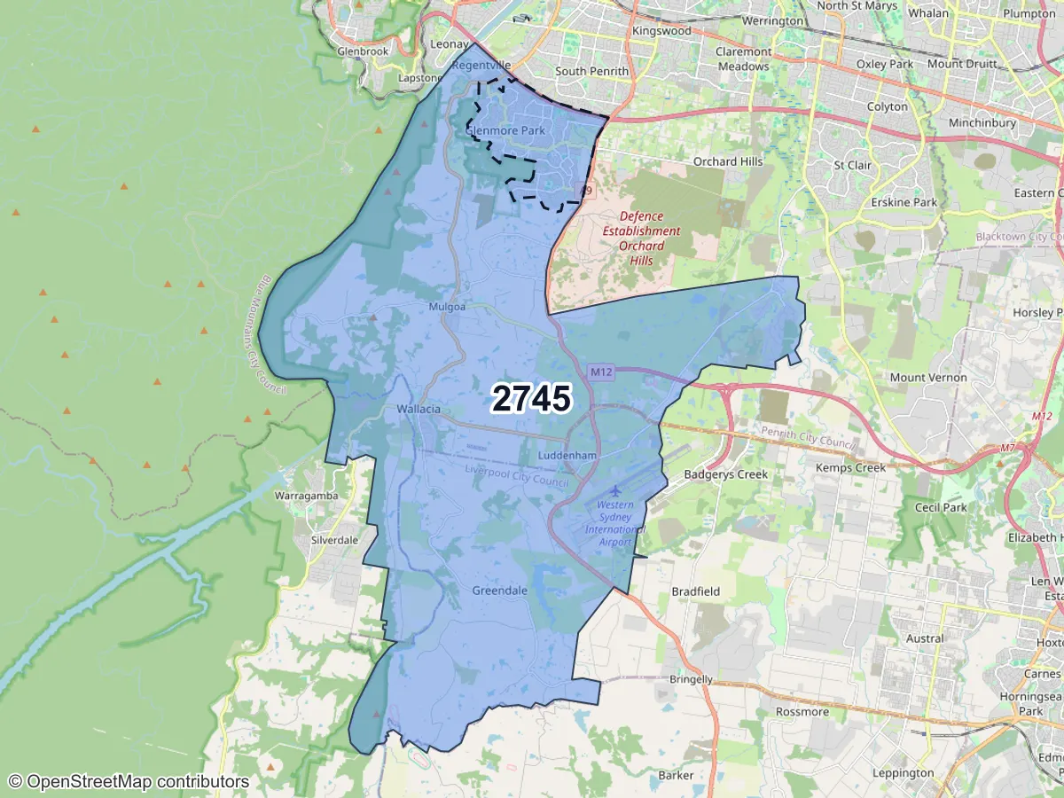 Map of Glenmore Park, NSW, showing its postcode areas as colored shapes and the suburb outline as a dashed line